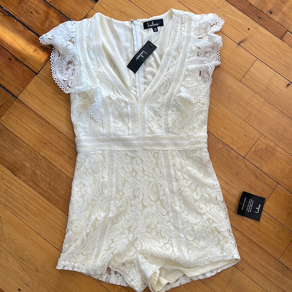 White lace short sleeve romper from Lulu’s. New with tags